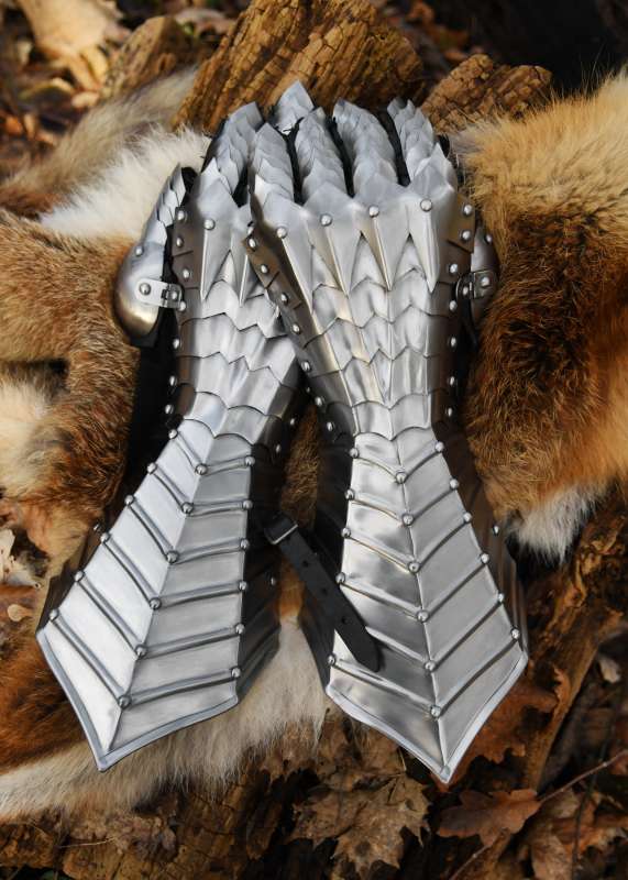 Gauntlets, polished, riveted and stitched.
