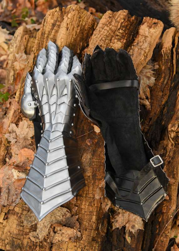Gauntlets, polished, riveted and stitched.