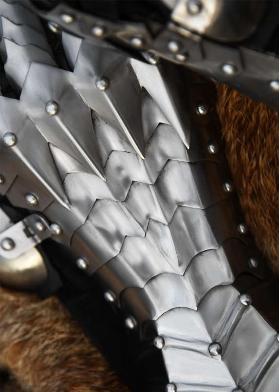 Gauntlets, polished, riveted and stitched.